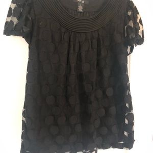 Woman’s black lace polka dot top